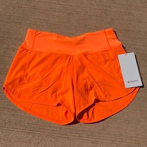 Orange Lululemon shorts
